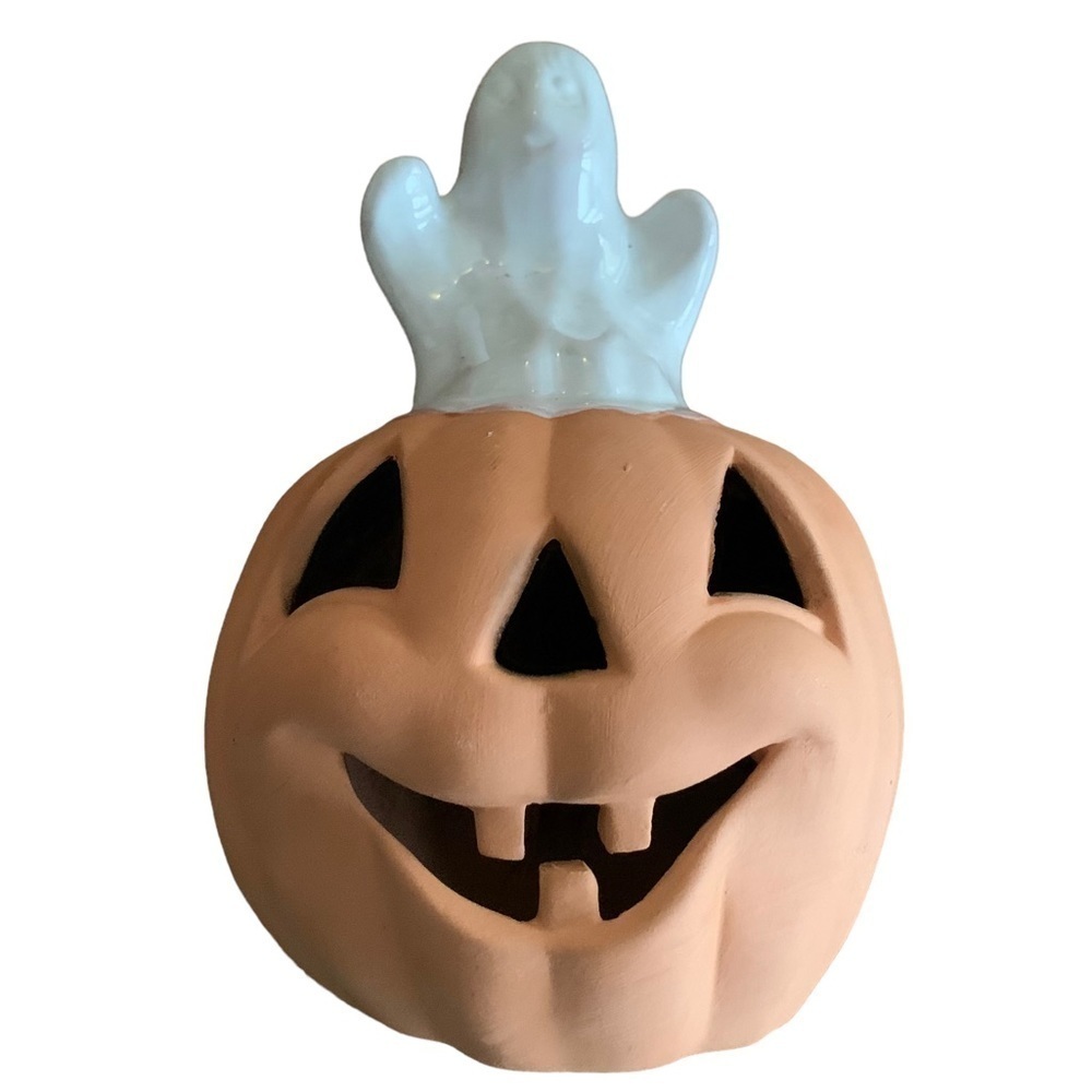 Ceramic Bisque Ghost Melting on Pumpkin Pottery